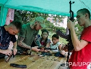 Сомнительная символика в лагере «Азовец»: зачем выглядеть, как сторонники «ДНР»?