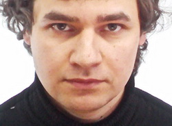 У Києві «Беркут» затримав і побив журналіста російського видання Lenta.doc
