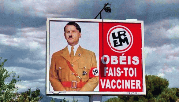 Президент Франції поскаржився на автора плаката, який зобразив його в образі Гітлера через заклик до обов'язкової вакцинації